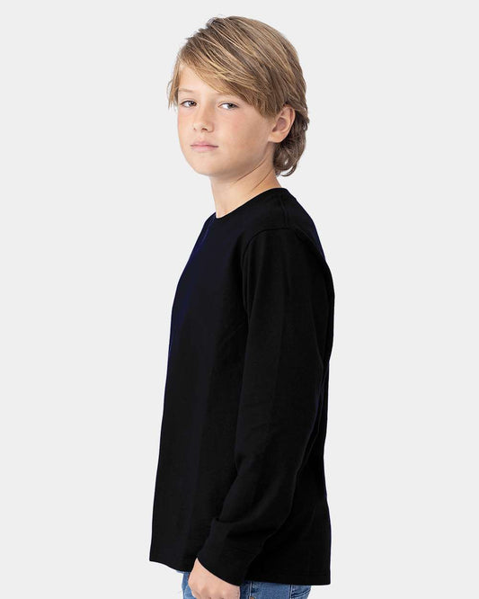 Youth combed cotton long sleeve tee on model, side