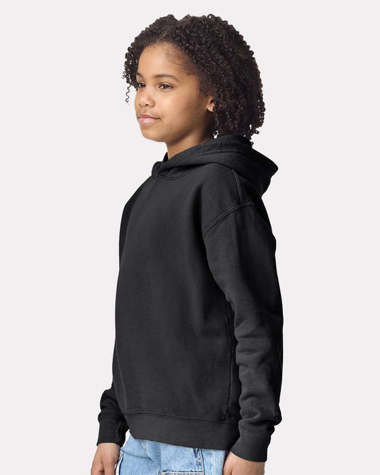 Youth garment-dyed hoodie on model, side