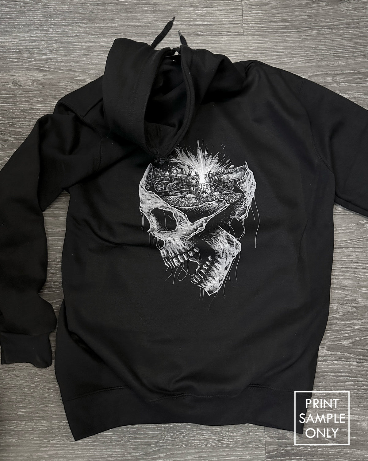 Sample back print on a black hoodie: skull artwork (print sample only)