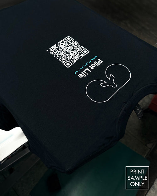 Sample print on a black t-shirt: QR code and logo (print sample only)