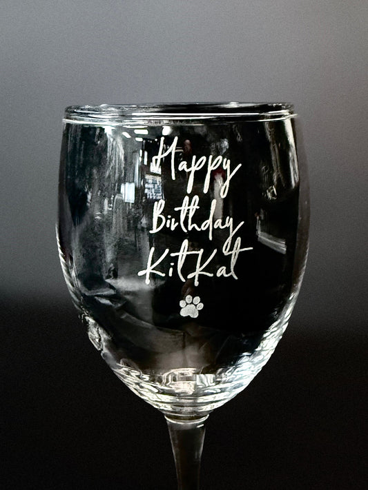 Custom Engraved Wine Glass – 11oz Tulip Design with Happy Birthday KitKat engraving and paw print detail.